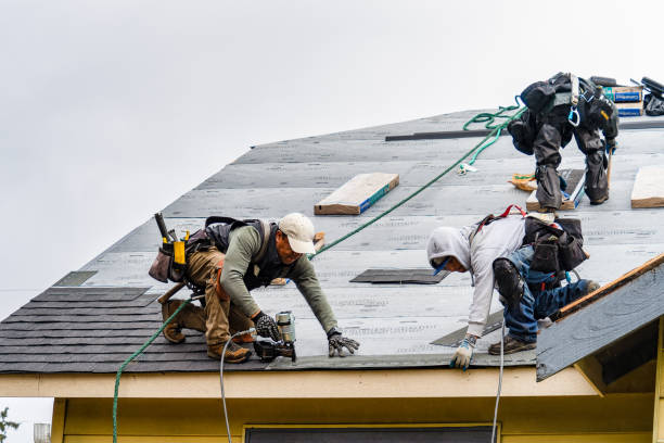 Professional Gutter Installation technician working in Grissom Arb, IN